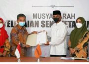 Implementasikan UU KIP, UNP dan Bawaslu Bukuttinggi MoU